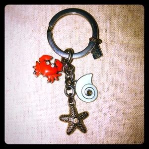 Coach crab keychain
